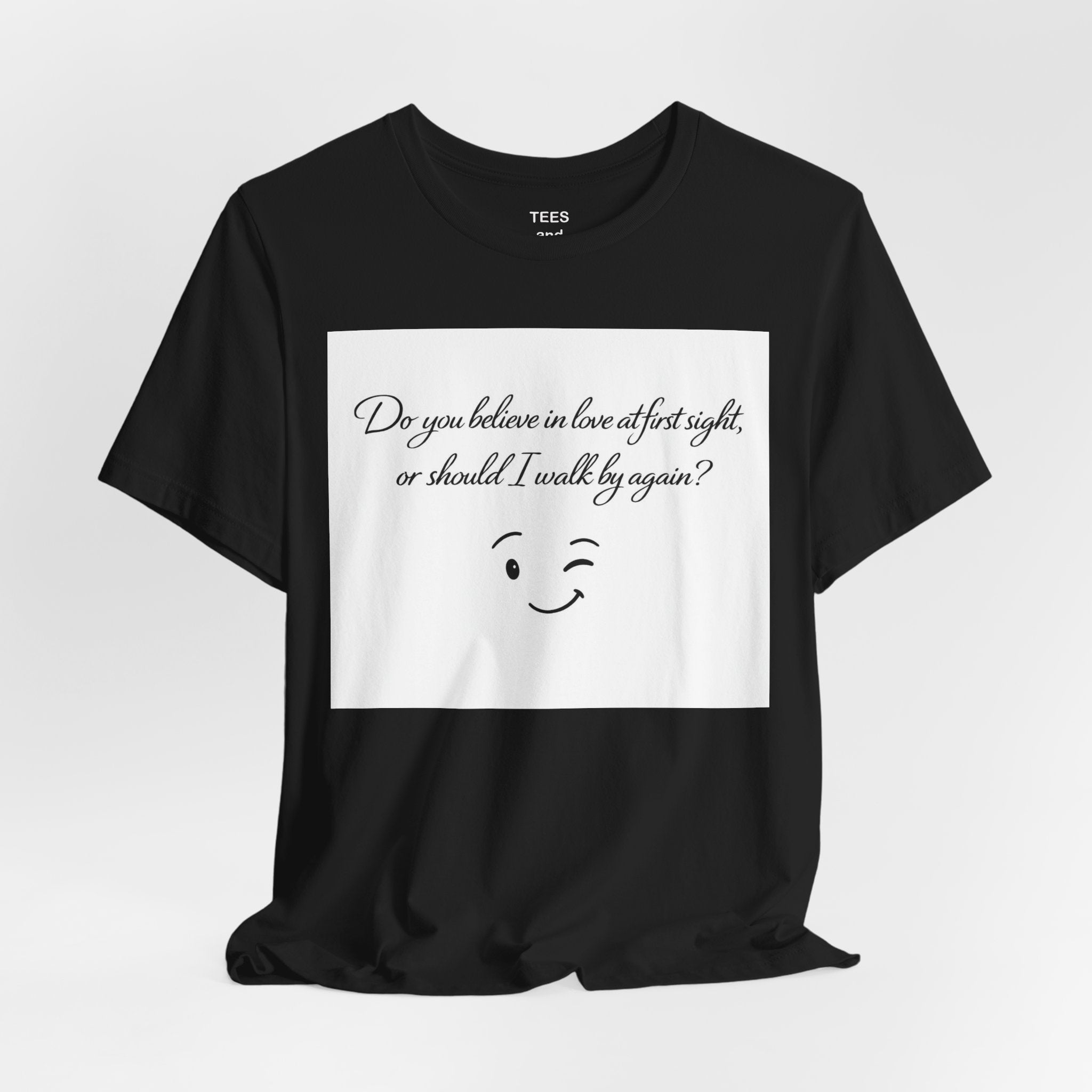 Winking Smile Tee — "Do you believe in love at first sight, or should I walk by again?"